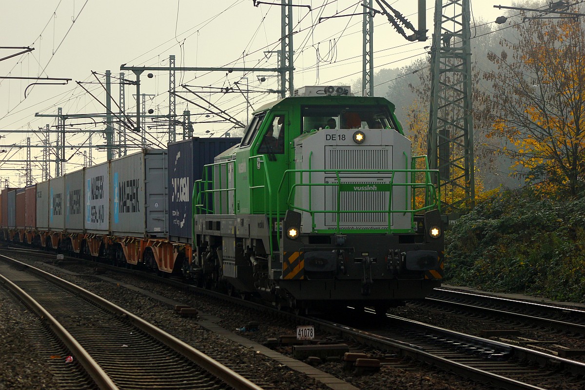Kleine berraschung am Vormittag...Vossloh G 18/ 4180 002-7(REV/VTLT/19.12.14, Zugelassen in D und F) dieselt hier kaum hrbar mit einem Containerzug durch Hamburg-Harburg. 04.11.2015