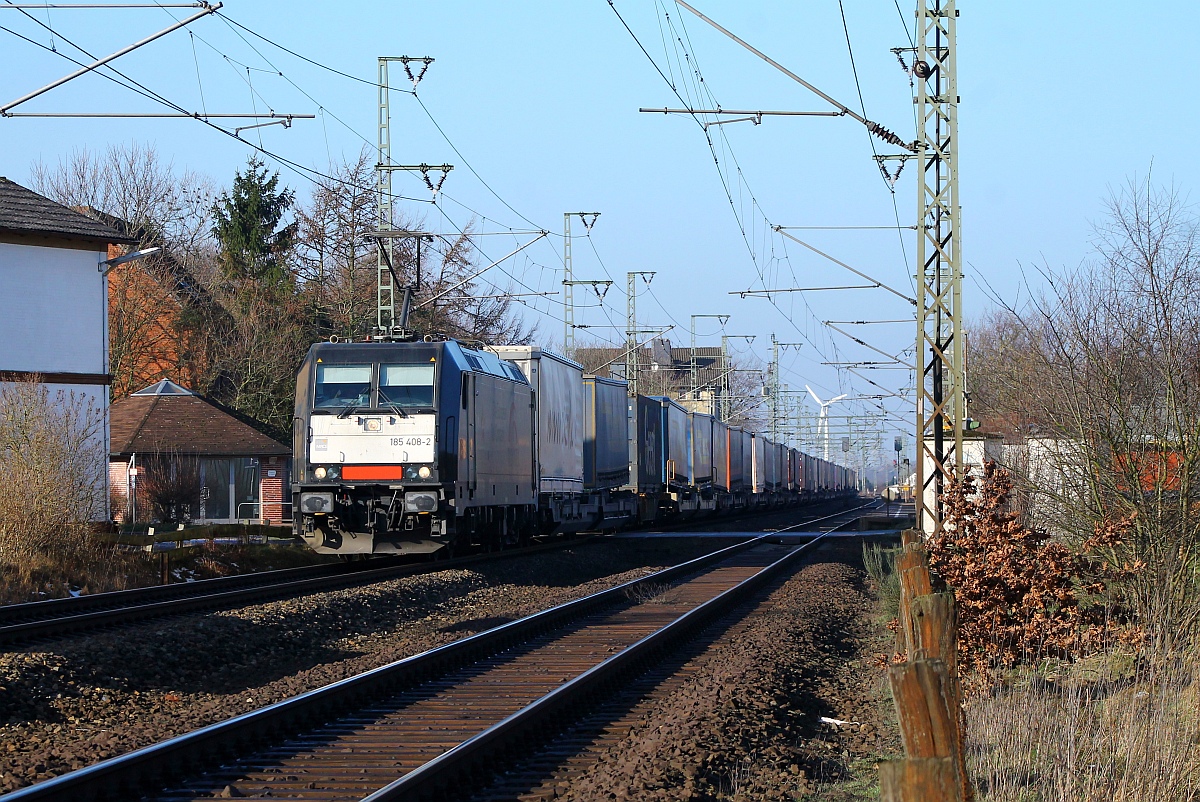 MRCE/TXL 185 408-7 mit DGS 45699 bei der Durchfahrt in Jübek. 02.02.2014