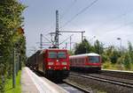 DBS/RSC 0 185 332-1 mit nem KLV nach Dänemark und die ausfahrende RB nach Neumünster festgehalten in Schleswig 23.08.2014