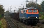 NBE 225 071-0(REV/LSX/03.04.12)und 225 079-3(09.08.12)fahren mit ihrem Dünger-Kalk-Zug in Jübek auf Gleis 3 ein. 16.10.2013