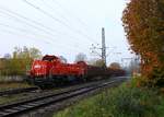 br-1-261-voith-gravita-10-bb/571821/261-030-1-dieselt-hier-mit-einem 261 030-1 dieselt hier mit einem Holzzug aus Jübek durch Schleswig. 10.11.2014