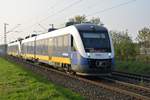 648 437 als RE10 nach Düsseldorf Hbf aus Osterath kommend bei Broicherseite gen Abzweig Weißenberg fahrend, hier biegt der Zug im Güterbahnhof Neuss in Richtung Düsseldorf ab.