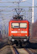 DB 112 150(-6)als Zuglok einer RB nach Neumünster hier aufgenommen kurz vor dem Halt in Jübek. 03.02.2014