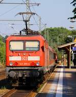 DB Regio 143 295-4 als Schublok einer RB nach Flensburg hier beim verlassen des Bahnhofes Schleswig festgehalten.