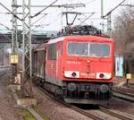 155 194-4 mit Misch-Gz aus Kiel Meimersdorf rauscht hier durch HH-Harburg. 02.03.2013