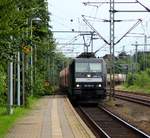 MRCE/CFL Cargo 185 567-5 zieht hier einen Zementzug aus Eichenberg(Deuna)durch Schleswig.