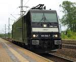 185 566-7 auf Solofahrt nach Padborg rollt hier durch den Bahnhof von Schleswig 23.06.2011