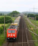 br-6-185-traxx-f140-ac1ac2-private/566983/dbstxl-185-404-1-unterwegs-mit-ihrem DBS/TXL 185 404-1 unterwegs mit ihrem KLV Zug nach Dänemark aufgenommen in Lürschau bei Schleswig. 01.06.2014