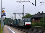 MRCE/TXL 185 408-2 mit dem DGS 45699 rauscht hier durch Schleswig gen Süden. 17.08.2014
