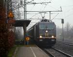 Hectorrail 241.008  Galore  mit Papierzug Richtung Dortmund bei der Durchfahrt in Jübek. 13.12.2013