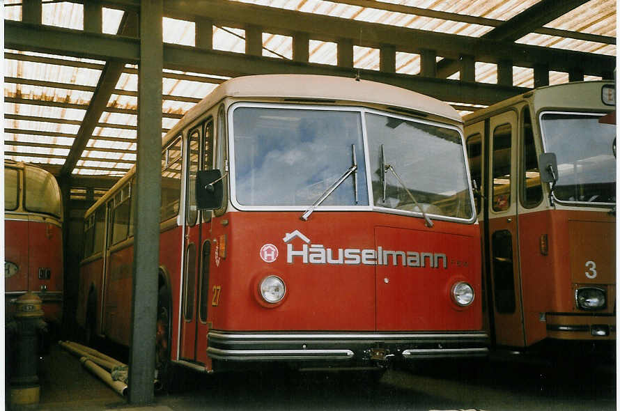 (069'329) - Huselmann, Bern (RWB) - Nr. 27 - FBW/R&J (ex AFA Adelboden Nr. 24; ex Steiner, Meikirch Nr. 1) am 10. Juli 2004 beim Bahnhof Wikon
