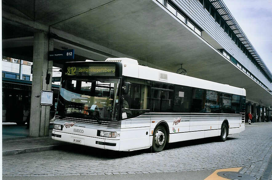 (075'828) - Ryffel, Uster - Nr. 75/ZH 26'347 - Iveco am 31. Mrz 2005 beim Bahnhof Uster