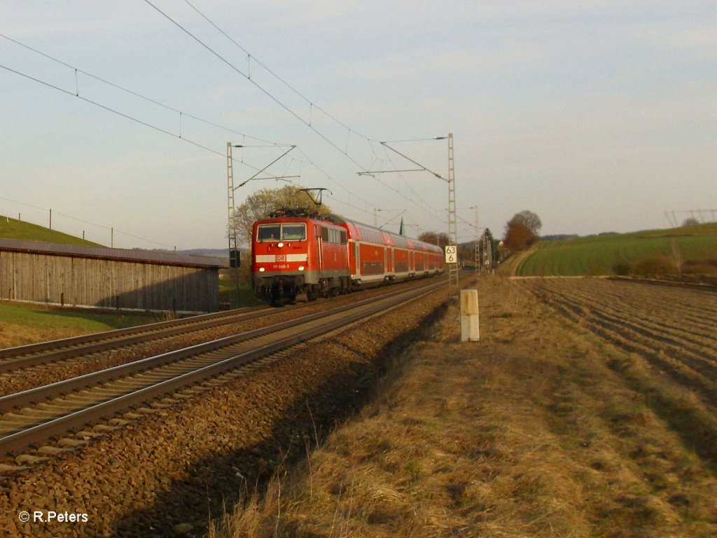 111 049-3 als RB59182 nach Pfaffenhofen (Inn) bei Fahlenbach. 24.03.11