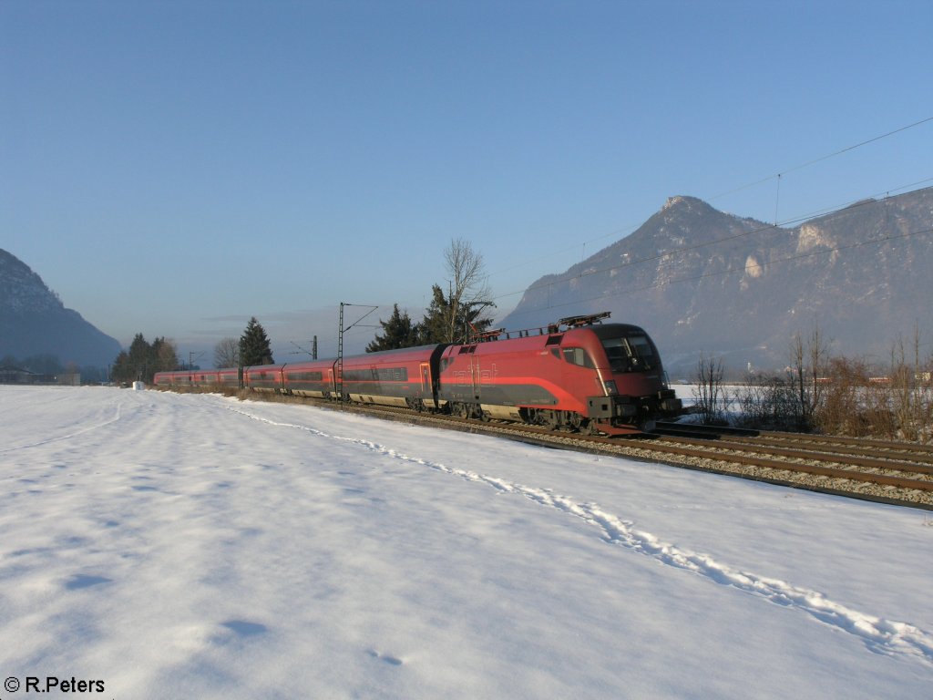 1116 204-7 zieht ein RJ bei Niederaudorf. 18.02.10