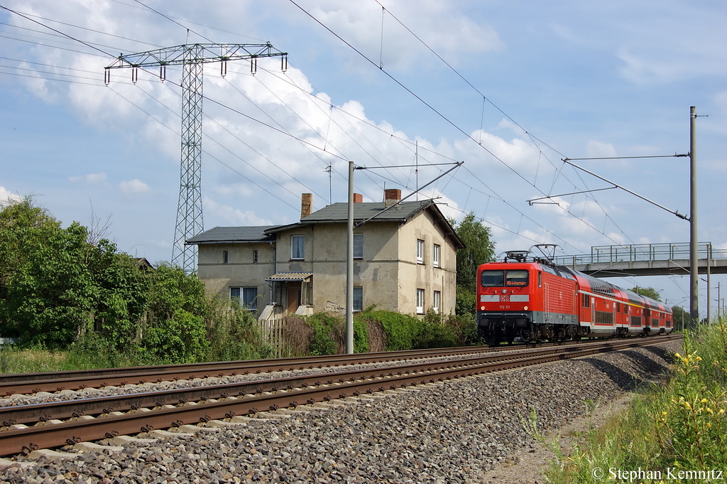 112 111 mit LED-Leuchten mit dem RE4 (RE 37314) von Ludwigsfelde nach Wismar in Vietznitz. 07.07.2011