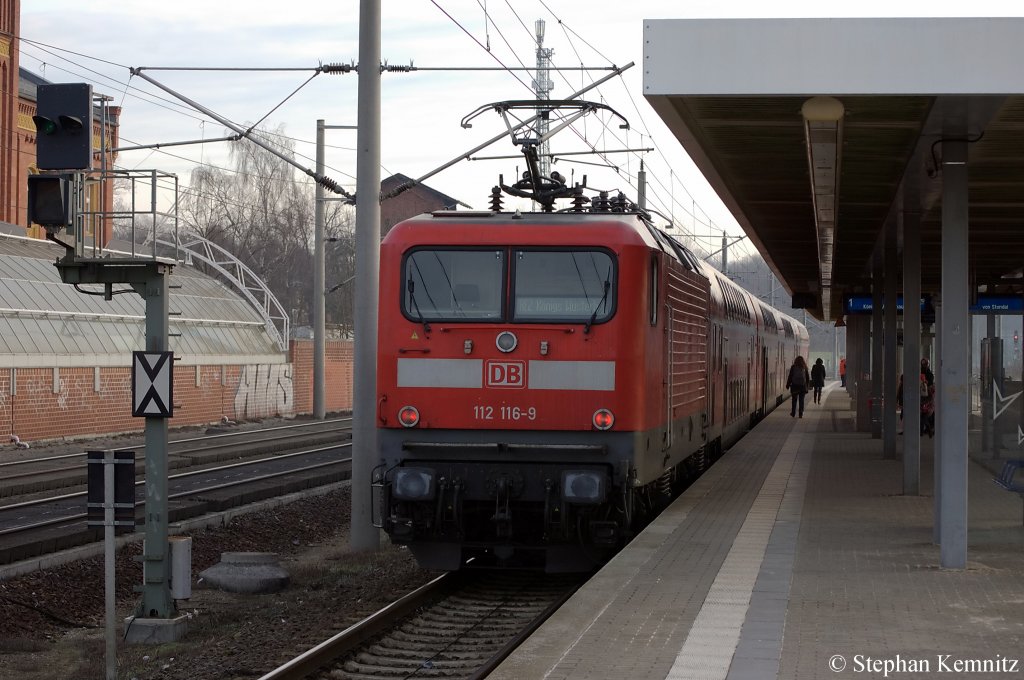 112 116-9 mit dem RE2 (RE 37377) nach Knigs Wusterhausen in Rathenow. 10.02.2011