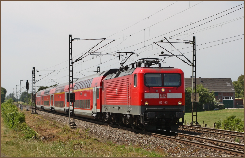 112 163 mit RE 11 nach Hamm am 04.06.11 in Nordbgge. Gre zurck ;)