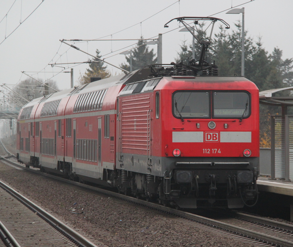 112 174-8 mit RE 17709 von Uelzen nach Halle(Saale)Hbf bei der Ausfahrt im Haltepunkt Tangerhtte