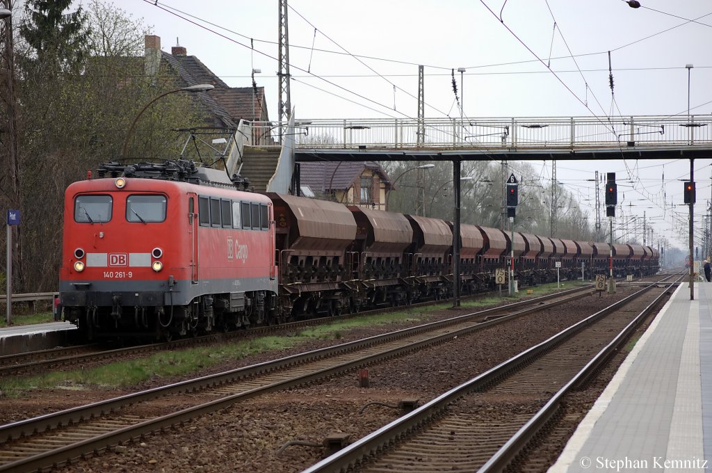 140 261-9 mit Schotterzug in Priort in Richtung Hennigsdorf unterwegs. 05.04.2011