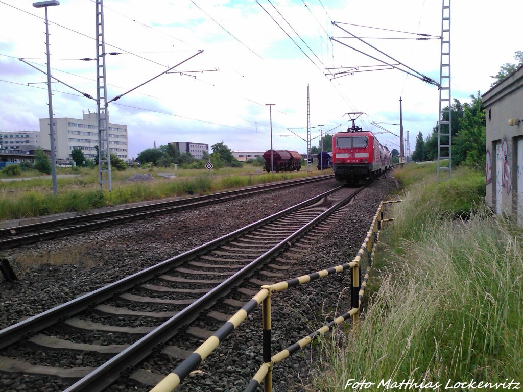 143 300-2 als S1 mit ziel Rostock Hbf zwischen den S-Bahn Hp. Rostock-Bramow & Holbeinplatz am 22.6.13