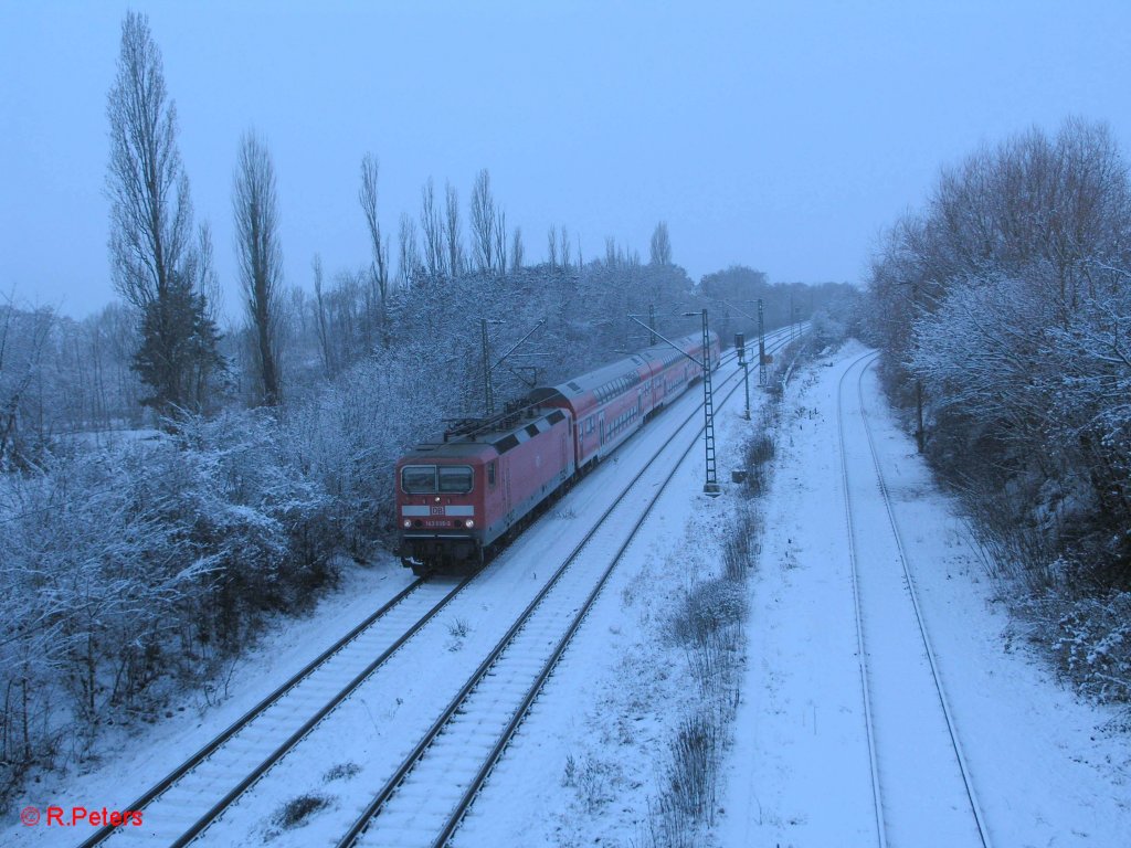 143 658-3 fhrt in Schkeuditz als S10 Leipzig HBf ein .23.12.09