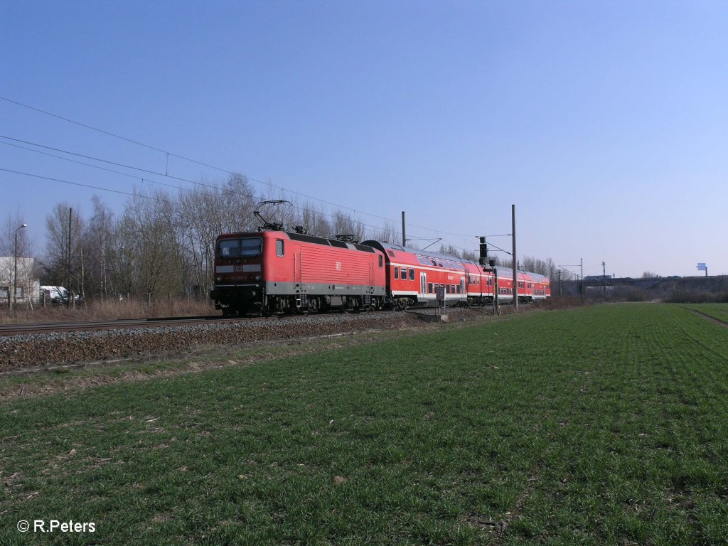 143 959-5 schiebt RE17691 Magdeburg HBf - Leipzig HBF bei Podelwitz. 29.03.11