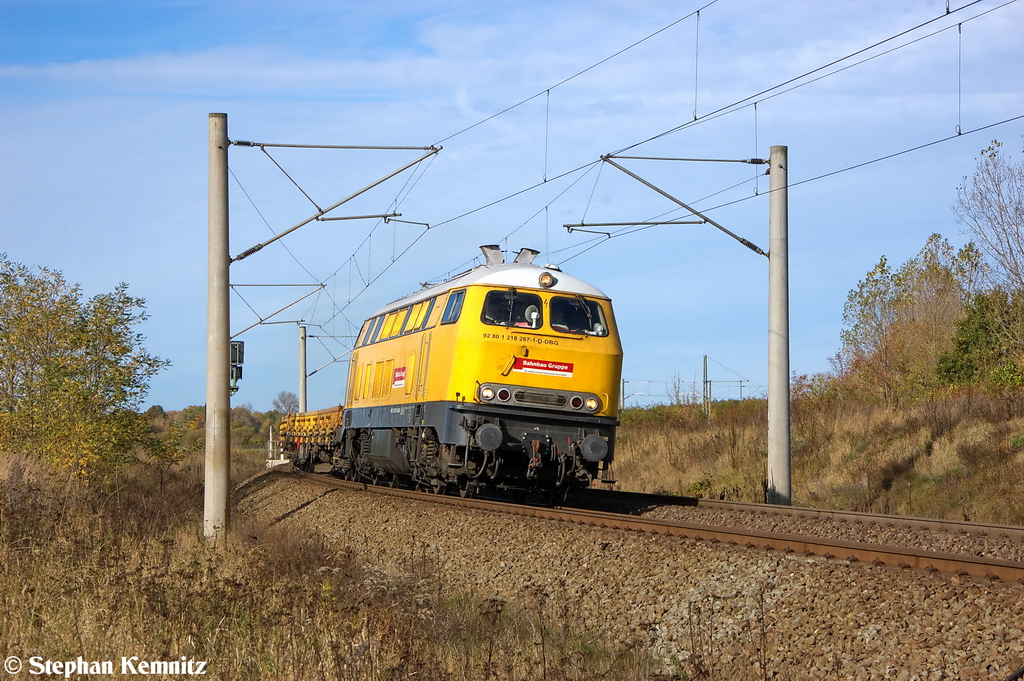 218 287-1 DBG - Deutsche Bahn Gleisbau GmbH mit einem kurzem Res Ganzzug in Stendal(Wahrburg) und fuhr in Richtung Hauptbahnhof weiter. 26.10.2012