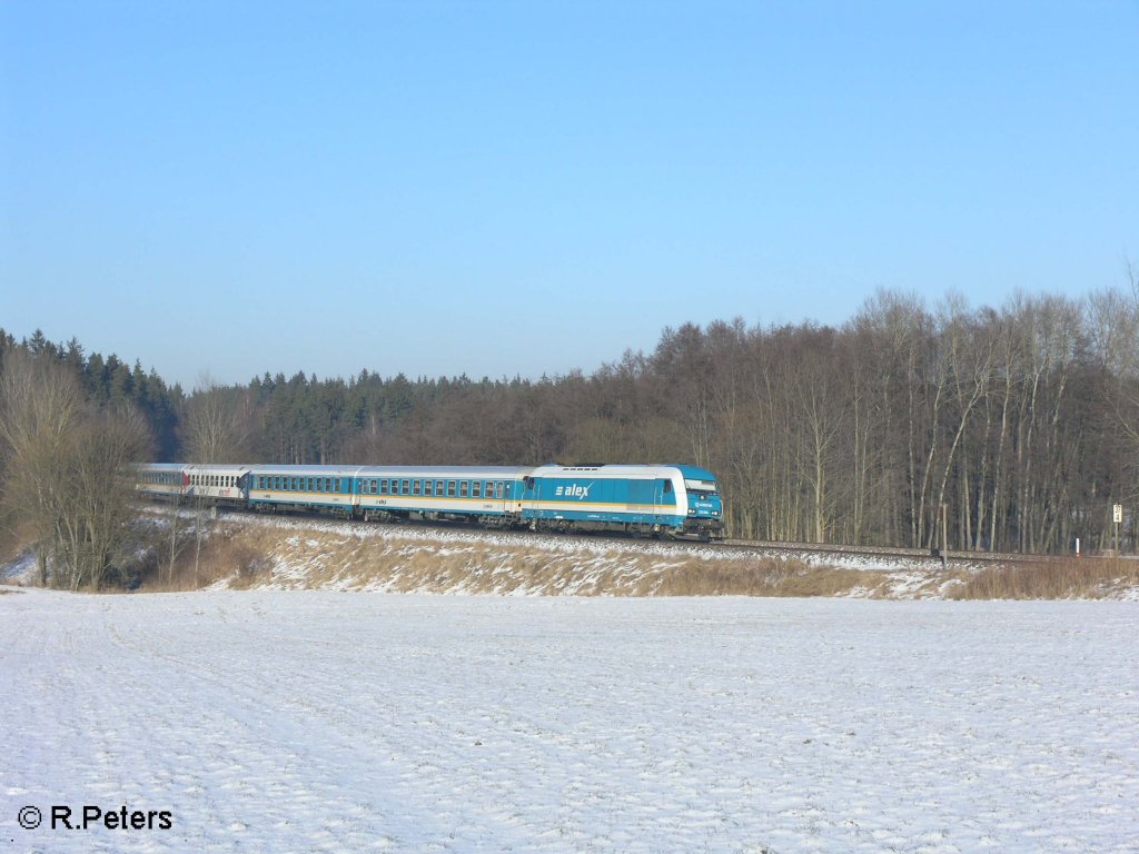 223 064 zieht den ALX37983 nach Mnchen durch die Kurve bei Oberteich. 10.01.09
