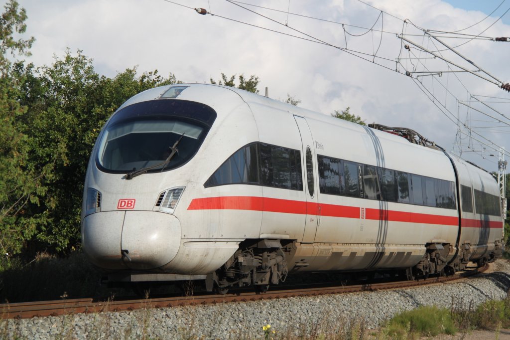 411 508-5 als ICE 1611 von Warnemnde nach Mnchen Hbf via Rostock-Seehafen bei der Durchfahrt in der Gterumgehung bei Rostock Hbf.01.09.2012