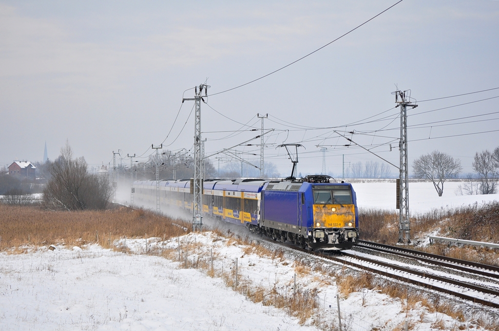 Ab nach  Leipsch ....die 146 522 hat am 29.01.2012 den Auftrag mit dem X 68904 in die schsische Messestadt zu fahren.Kurz nach dem verlassen der Hansestadt Rostock wurde sie in Sildemow abgepasst.