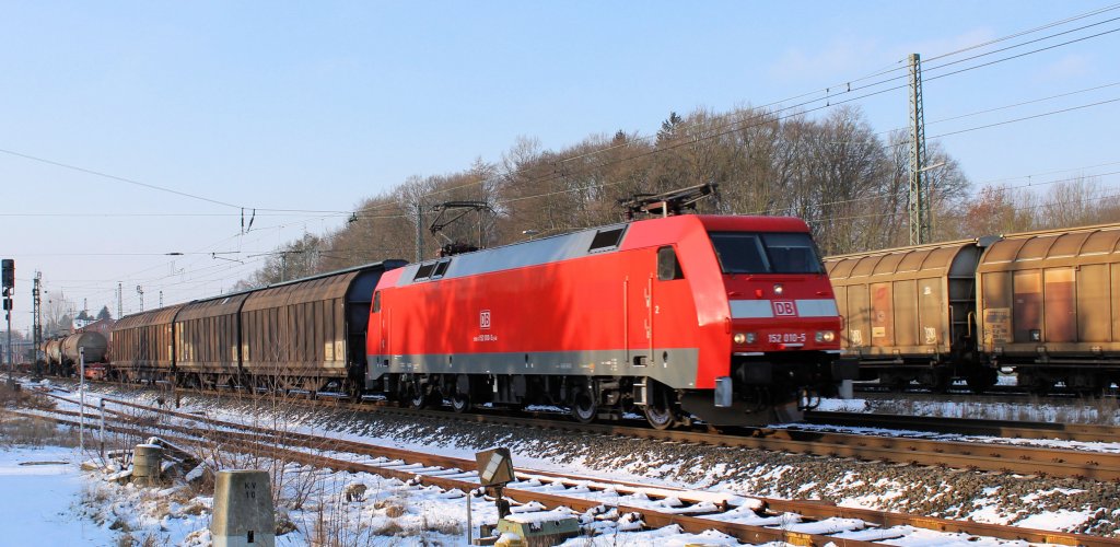 BR 152 010-5 mit einen gemischten Güterzug auf den Weg nach Rbf Maschen / Hamburg. Tostedt den 31.01.2012