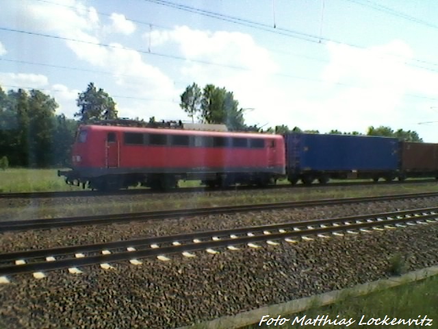 BR140 mit einem Gterzug in Hagenow Land am 8.6.13