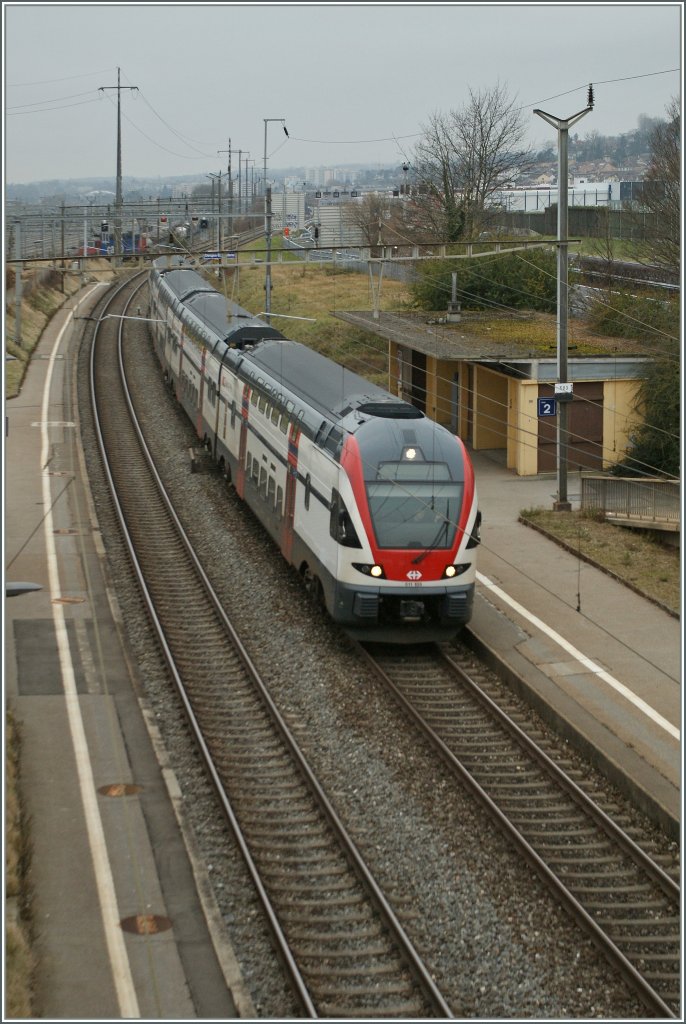 Der RABe 511 105 auf dem Weg Richtung Lausanne bei der Durchfahrt in Denges Echandens. 
7. Jan. 2013