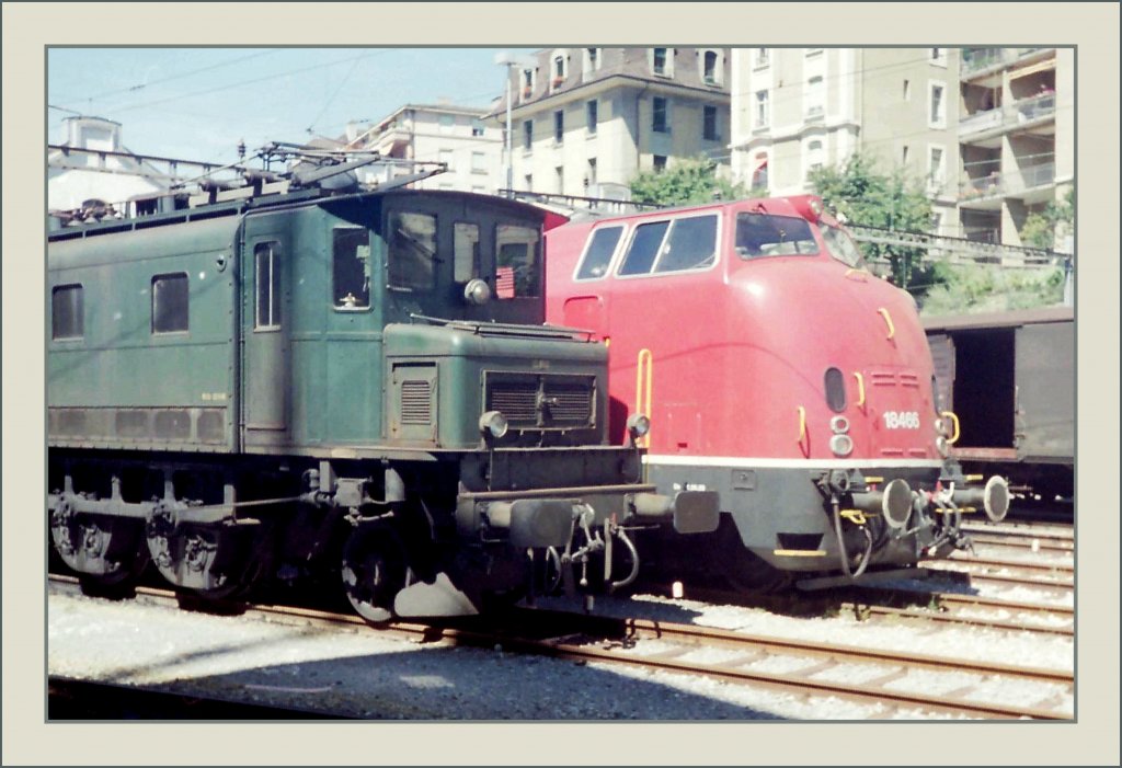 Die zwei doch sehr ungleichen  Gesichter  zweier Klassiker: Ae 4/7 und V 200 (hier als Am 4/4). 
(Sept. 1990/Gescanntes Negativ)

