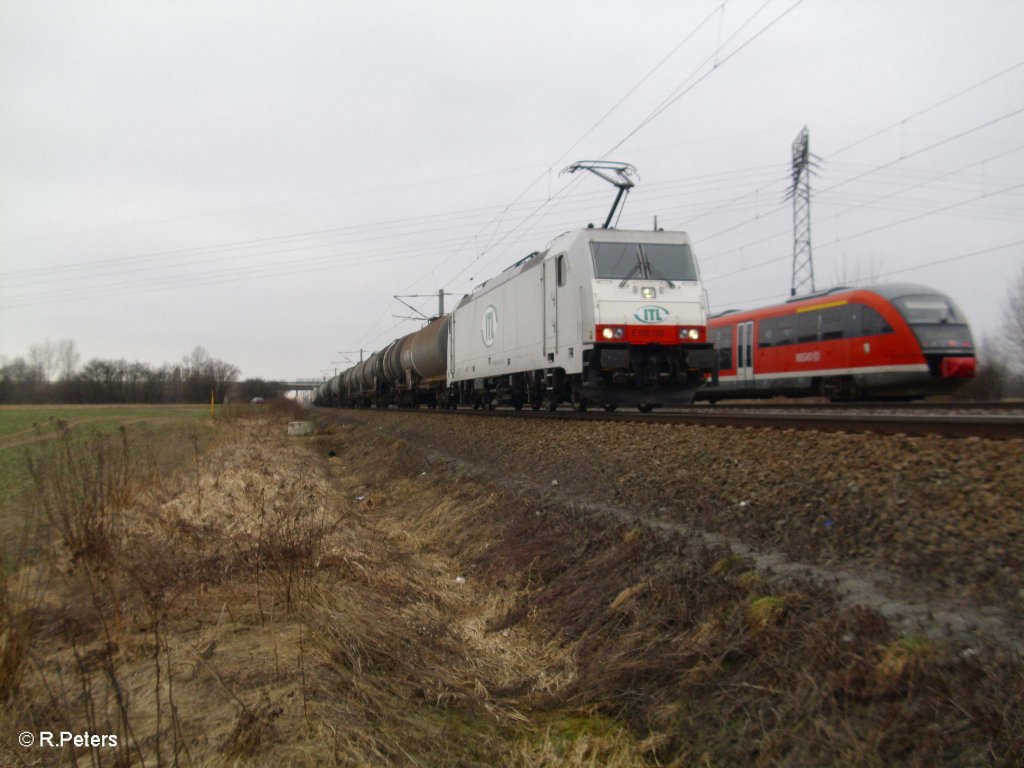 E186 138 mit Kesselzug bei Borsdorf. 05.03.11