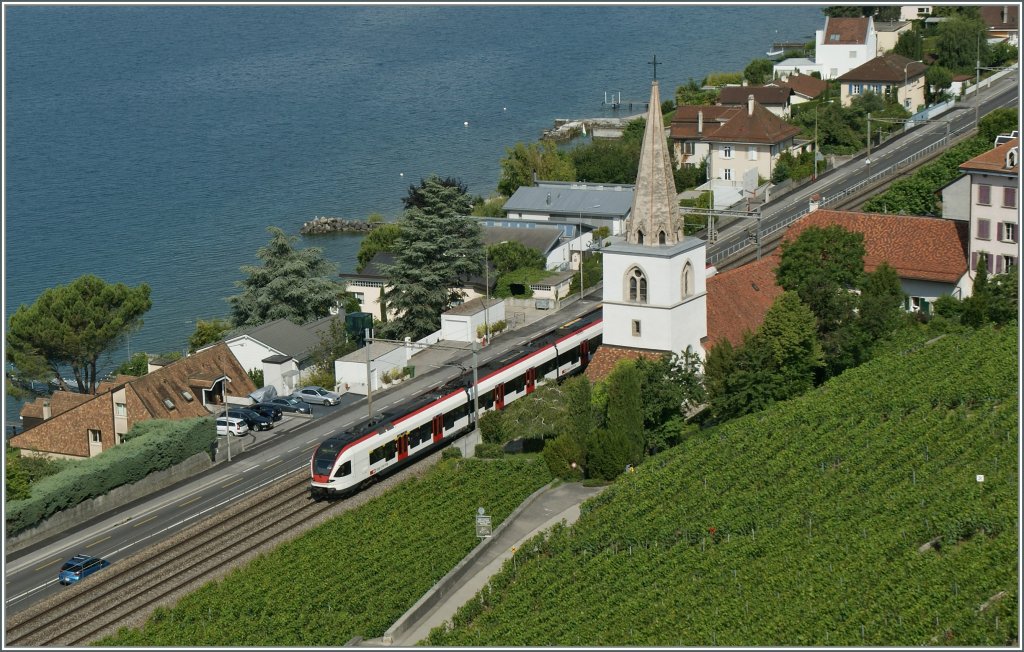 Ein SBB  Flirt  RABe 523 auf der Fahrt nach Villeneuve bei Villette (VD).

15. Juni 2011 