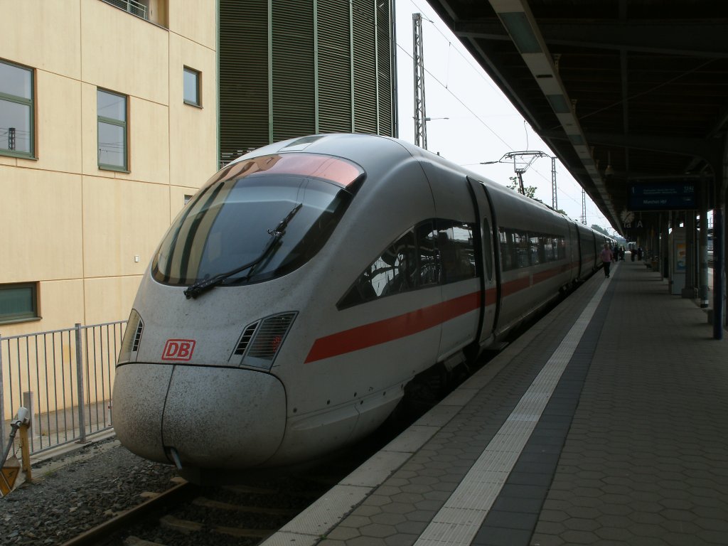 ICE 411 066/566 als ICE 1715 Binz-Mnchen,am 03.September 2011,in Stralsund.