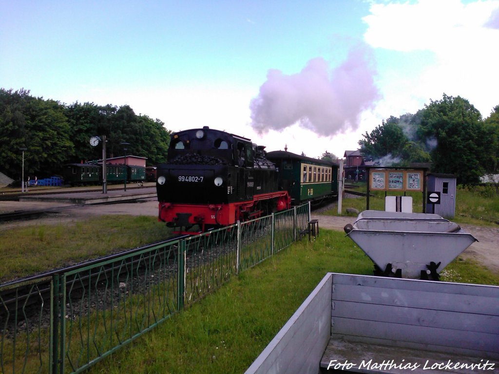 RBB 99 4802 unterwegs nach Ostseebad Ghren bei der Ausfahrt aus Putbus am 29.5.13