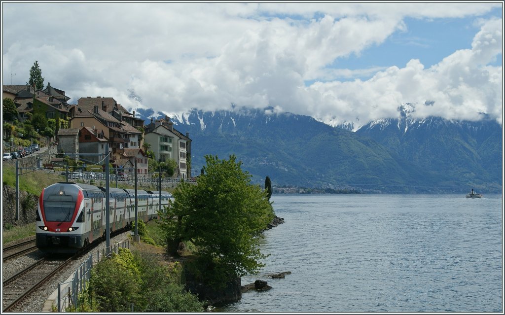 SBB RABe 511 106 auf der Fahrt von Vevey nach Genve bei St-Saphorin.
30. Mai 2013 