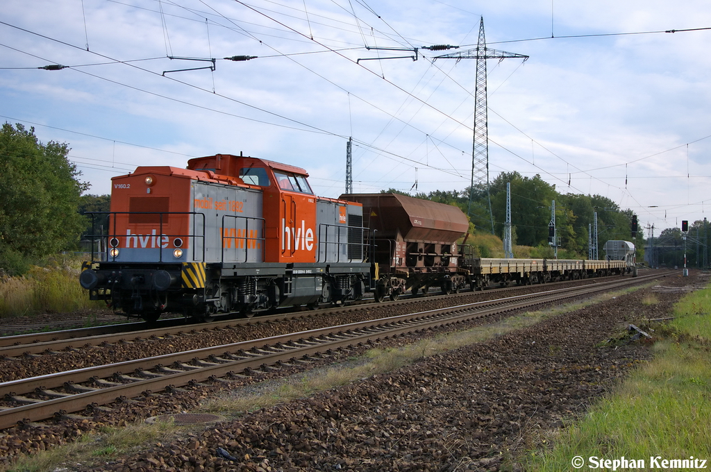 V160.2 (203 014-6) hvle - Havellndische Eisenbahn AG mit einem gemischtem Gterzug in Satzkorn und fuhr in Richtung Priort weiter. 02.10.2012