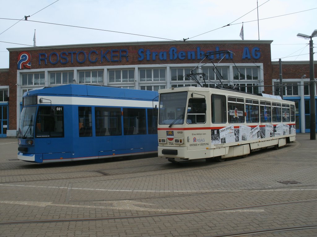 Vor der Triebwagenhalle im Rostocker Depot Hamburger Strae standen,am 09.Mai 2013,der Tw 681 und 704.