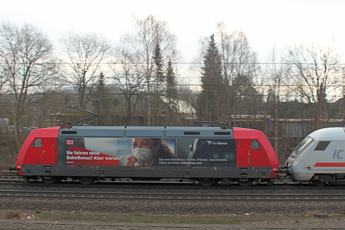 101 115-4 mit IC 2212(Koblenz-Binz) am 10.02.2023 in Tostedt.