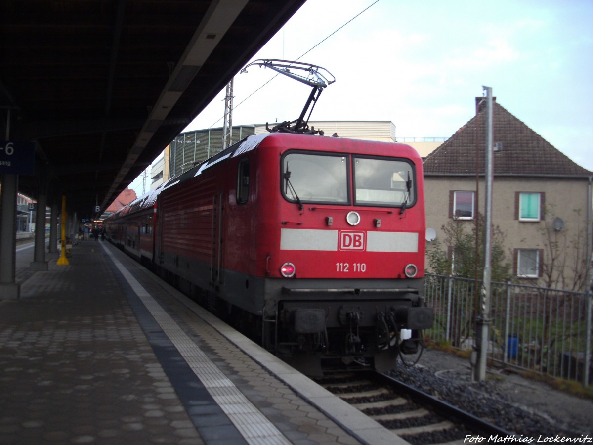 112 110 als RE3 mit ziel Elsterwerda im Bahnhof Stralsund Hbf am 14.11.13