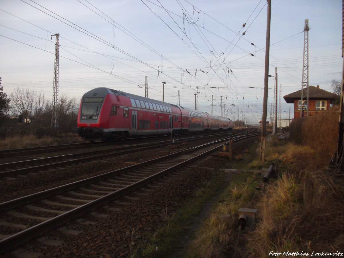 112 116-9 mit dem RE5 aus Holzdorf (Elster) mir ziel Stralsund Hbf kurz vor dem endbahnhof stralsund Hbf am 4.1.14