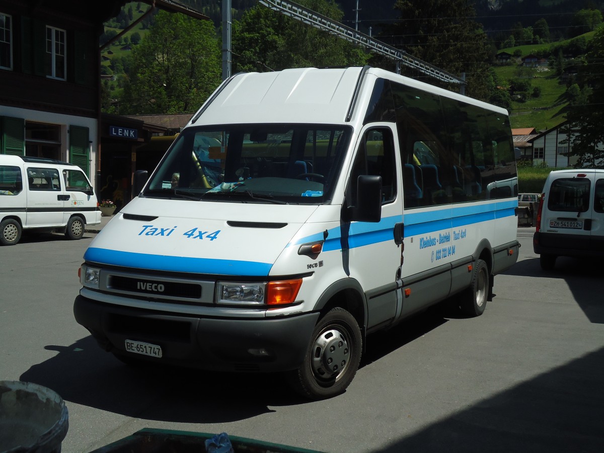 (133'934) - Ueltschi, Zweisimmen - BE 651'747 - Iveco am 30. Mai 2011 beim Bahnhof Lenk