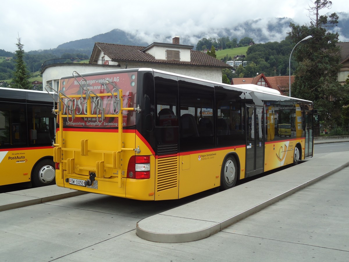 (134'157) - Dillier, Sarnen - Nr. 10/OW 10'250 - MAN am 11. Juni 2011 beim Bahnhof Sarnen