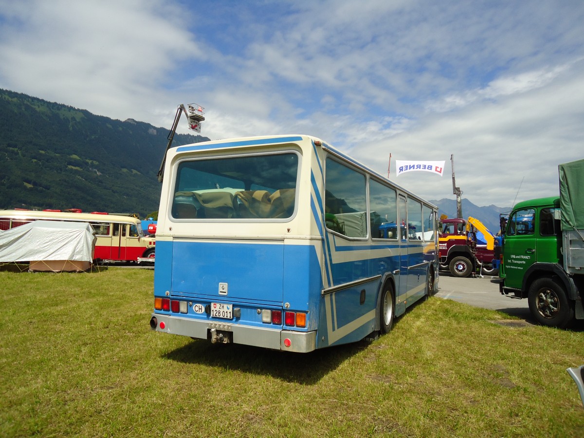 (134'405) - Mantel, Elgg - ZH 128'011 - Saurer/Tscher (ex LLB Susten Nr. 12) am 25. Juni 2011 in Interlaken, Flugplatz