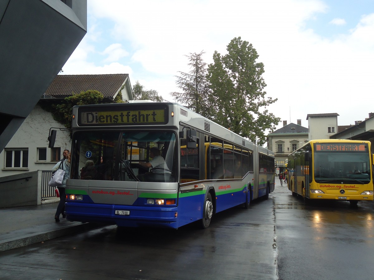 (138'863) - AAGL Liestal - Nr. 84/BL 7030 - Neoplan (ex TPL Lugano Nr. 423; ex TPL Lugano Nr. 44) am 16. Mai 2012 beim Bahnhof Liestal