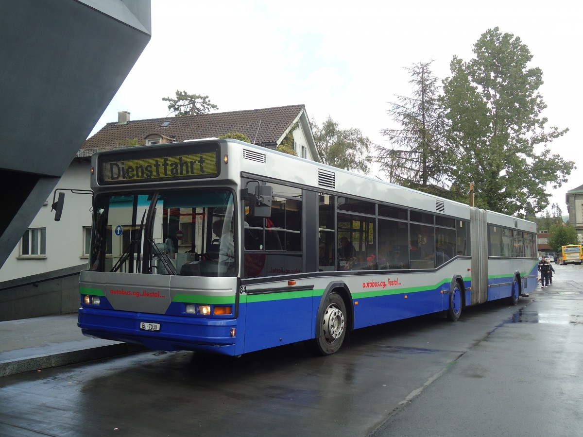 (138'864) - AAGL Liestal - Nr. 84/BL 7030 - Neoplan (ex TPL Lugano Nr. 423; ex TPL Lugano Nr. 44) am 16. Mai 2012 beim Bahnhof Liestal