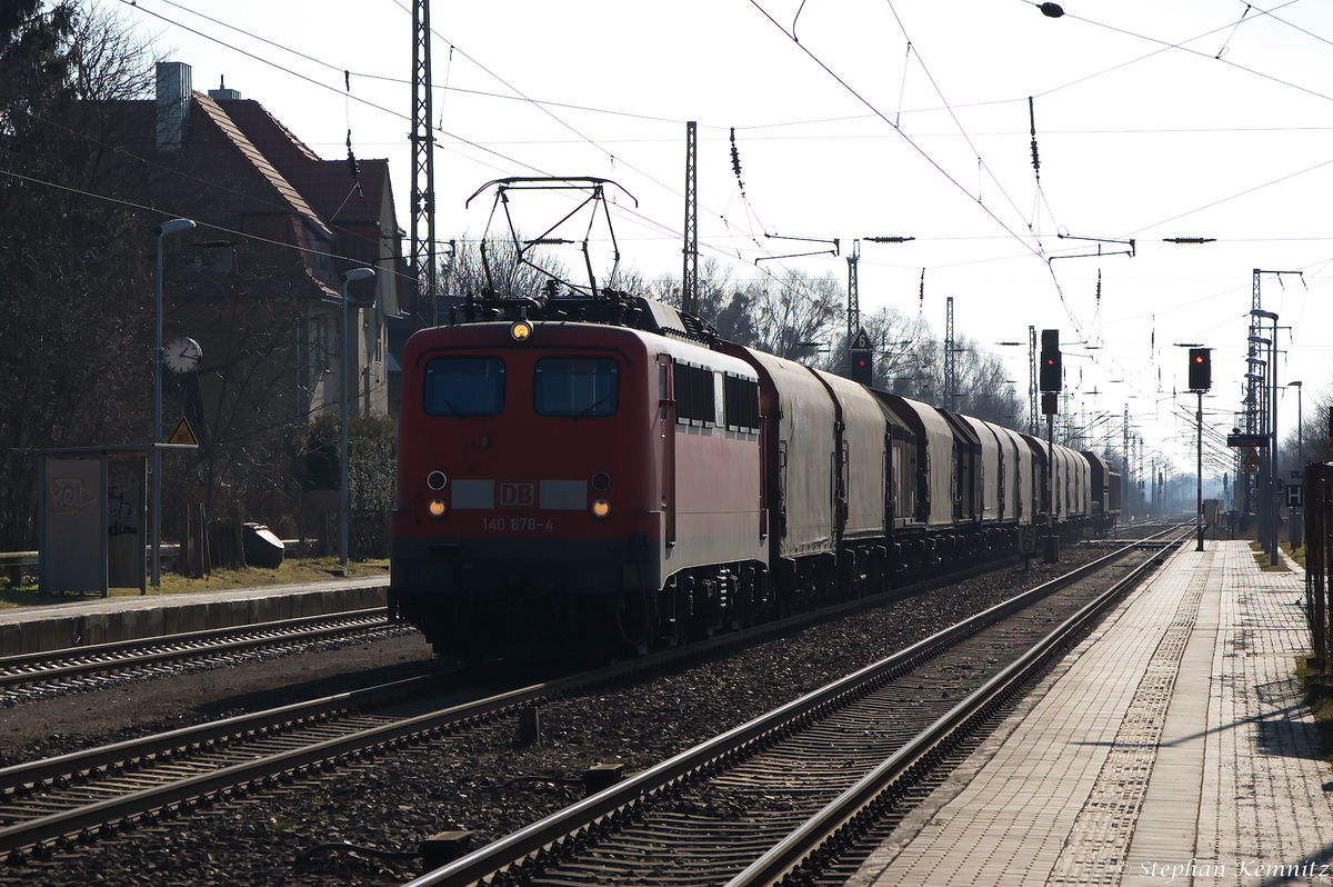 140 678-4 DB Schenker Rail Deutschland AG mit einem gemischtem Güterzug in Priort und fuhr weiter in Richtung Kreuz Wustermark. 26.02.2015